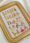 Variedades de charms con baño de oro... pide lo antes se agote✨️$180 cada uno🫶🤍