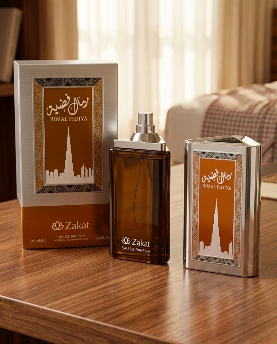 Las notas olfativas del perfume Zakat Rimal Fidiya (Ramal Fidaya) despliegan una fragancia cálida, especiada y profundamente oriental a través de su pirámide olfativa:base cremosa, dulce y sumamente reconfortante dominada por vainilla, caramelo, ámbar.💛✨