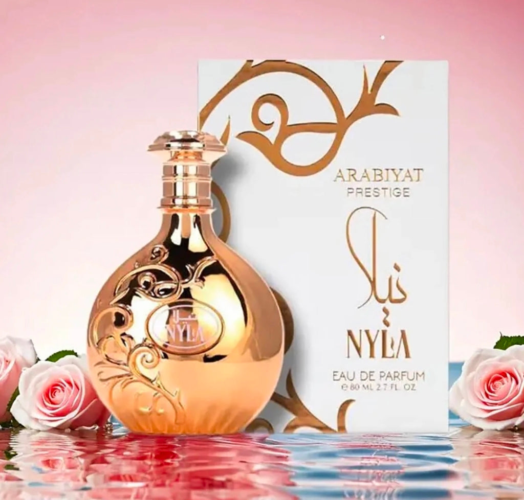 Arabiyat Prestige Nyla (Eau de Parfum, 80ml) – Fragancia Árabe de Lujo, es un Eau de Parfum que combina la opulencia del Medio Oriente con una frescura moderna e irresistible.