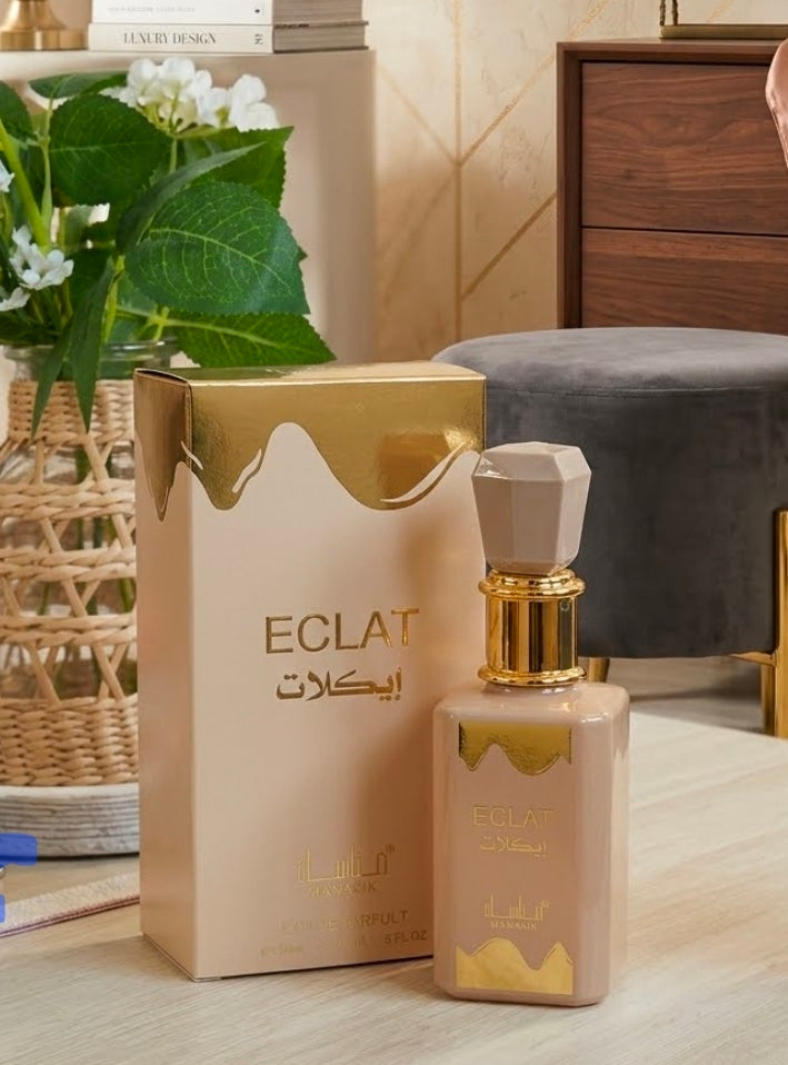 Eclat de Manasik revelan una fragancia predominantemente fresca, Sus notas son de leche y caramelo en la salida, miel y flores blancas en el corazón, concluyendo con una base densa de vainilla, praliné y almizcle. Inspiración.