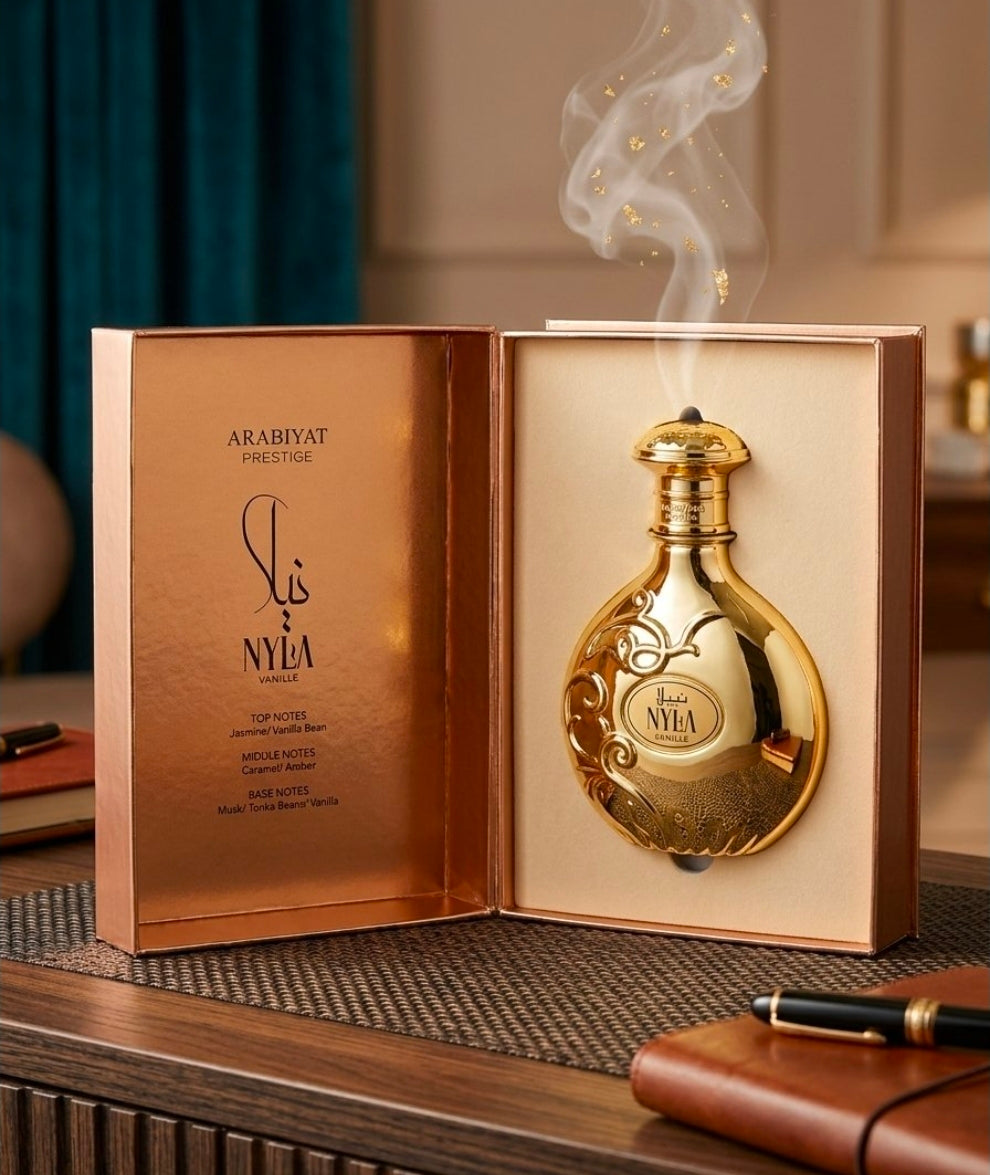 Nyla Vani-Elle de Arabiyat Prestige.Caramelo (Caramel) y Ámbar (Amber). Es el cuerpo del perfume, el cual le otorga ese aroma dulce, cálido y sumamente gourmand. Unisex