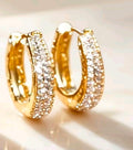 Argolla chapada en 14k, redondas, diseño moderno perfectas para uso diario.