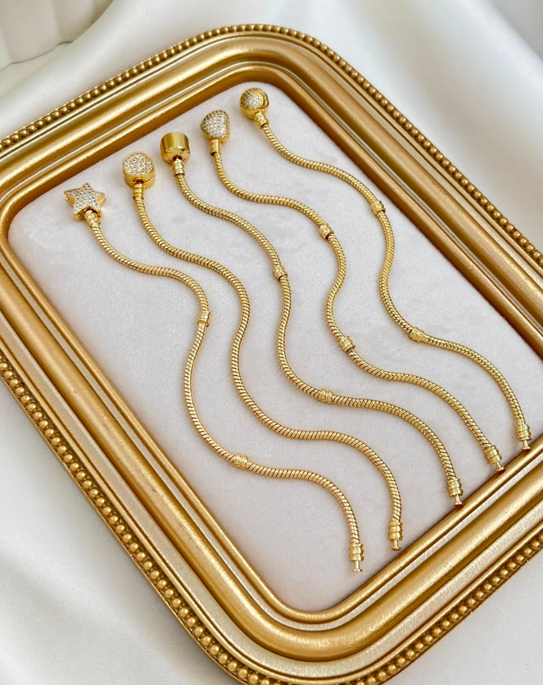 Pulseras multi charms... baño de oro ✨️💛 pidela antes que se agote🫶♥️ $390 cada una🙌