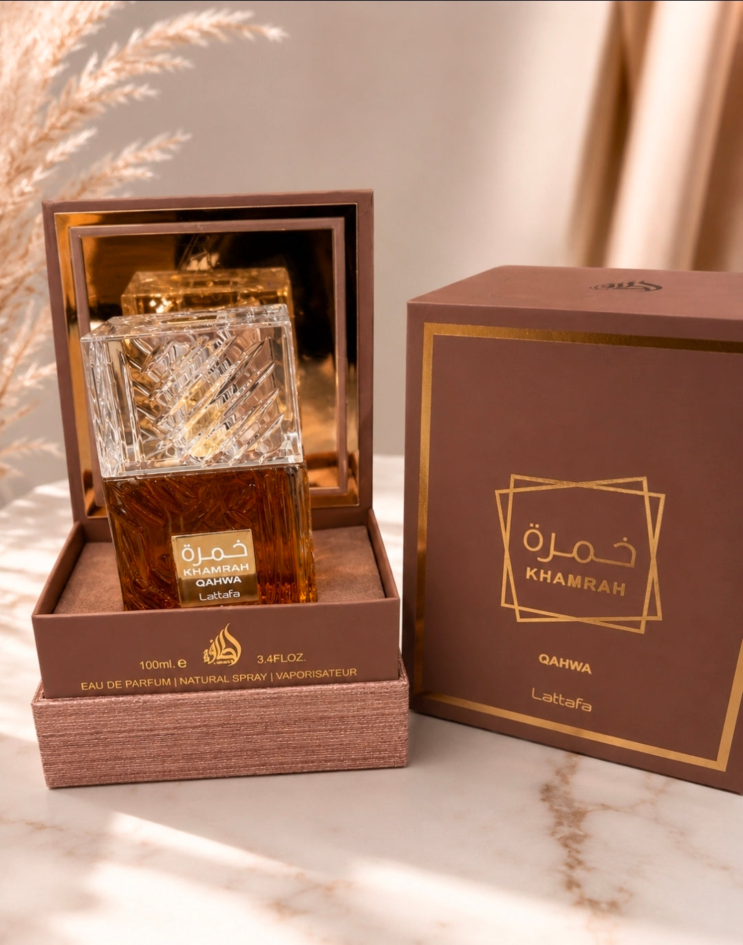 Lattafa Presenta la botella de corte de diamante de Khamrah y el diseño elegante y acanalado de Qahwa. Inspiración