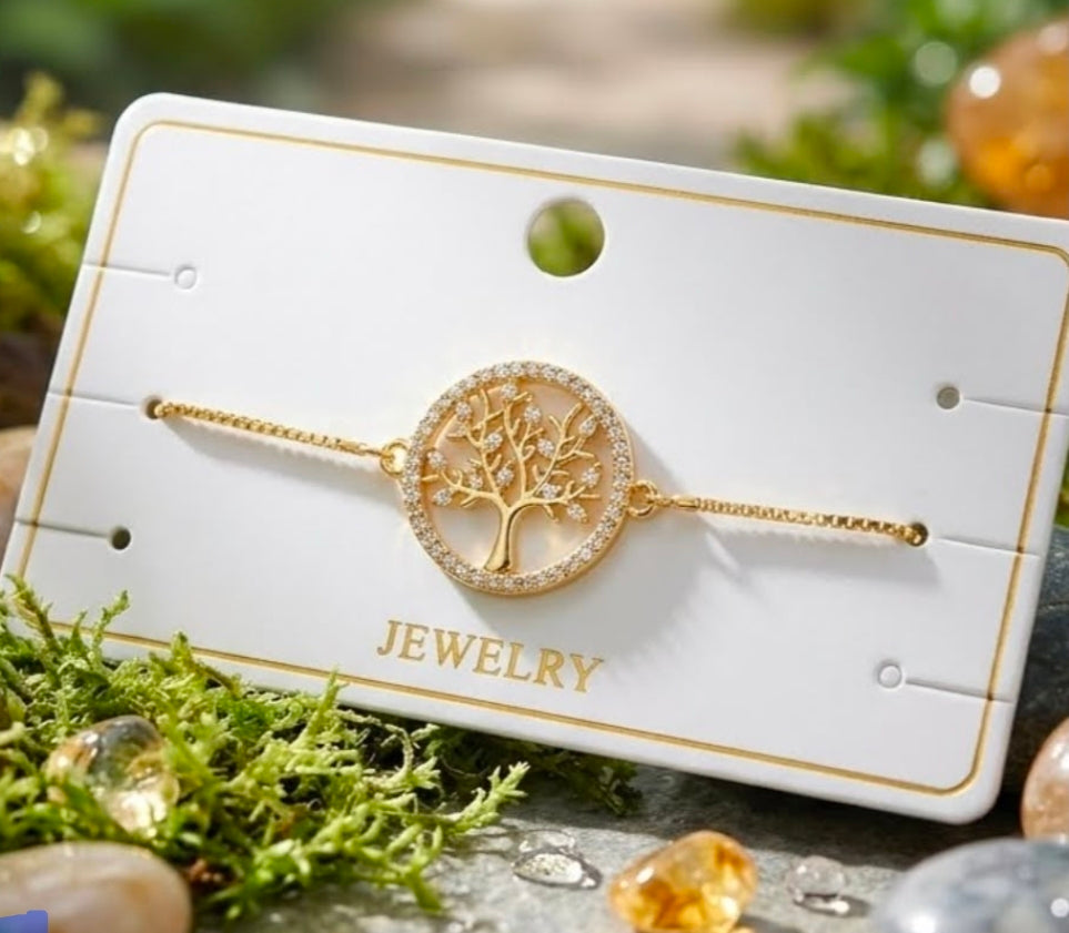 Elegante pulsera de mujer con baño de oro, con el diseño de el arbol familiar.