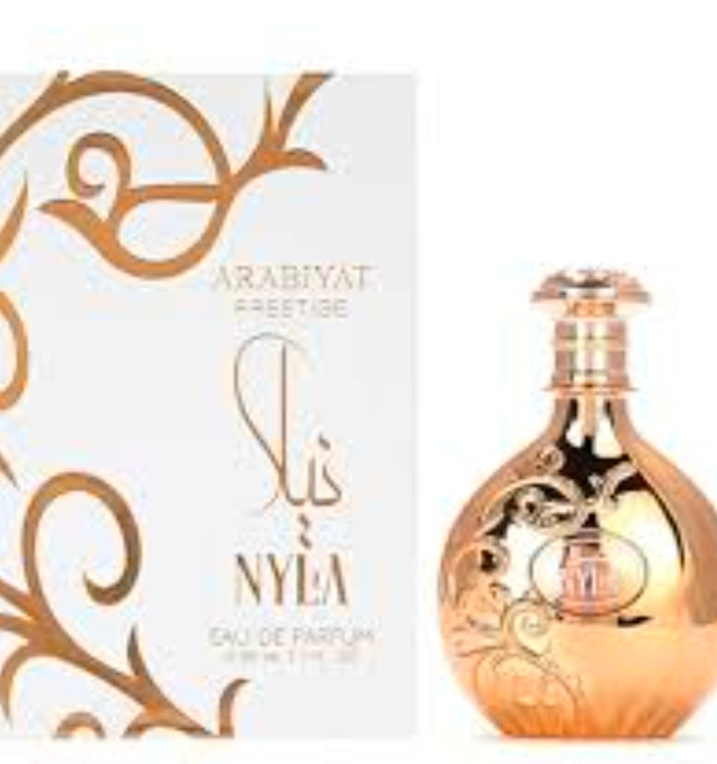 Arabiyat Prestige Nyla (Eau de Parfum, 80ml) – Fragancia Árabe de Lujo, es un Eau de Parfum que combina la opulencia del Medio Oriente con una frescura moderna e irresistible.