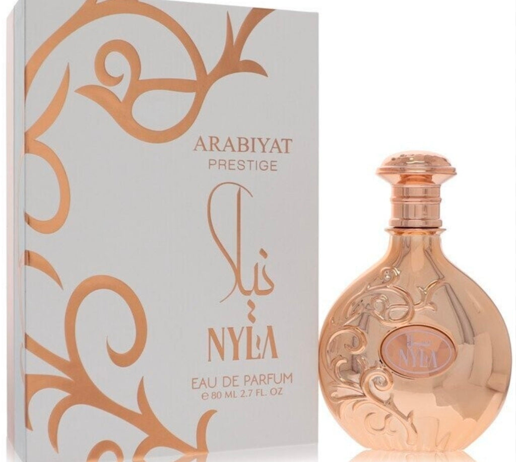 Arabiyat Prestige Nyla (Eau de Parfum, 80ml) – Fragancia Árabe de Lujo, es un Eau de Parfum que combina la opulencia del Medio Oriente con una frescura moderna e irresistible.