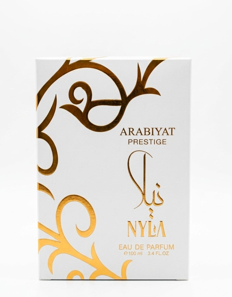 Arabiyat Prestige Nyla (Eau de Parfum, 80ml) – Fragancia Árabe de Lujo, es un Eau de Parfum que combina la opulencia del Medio Oriente con una frescura moderna e irresistible.